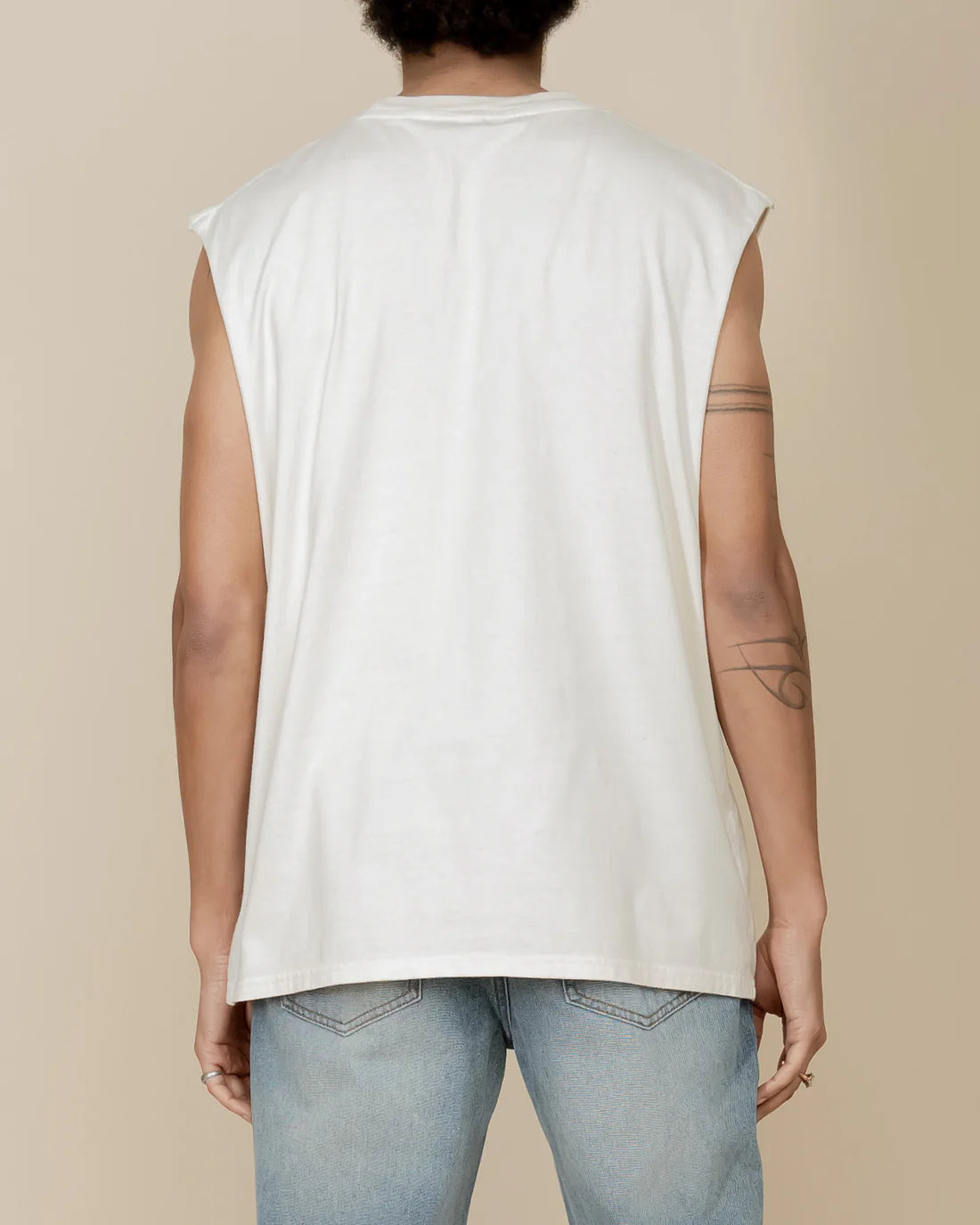 8586: SLEEVELESS MUSCLE TEE (CREAM) back view on model