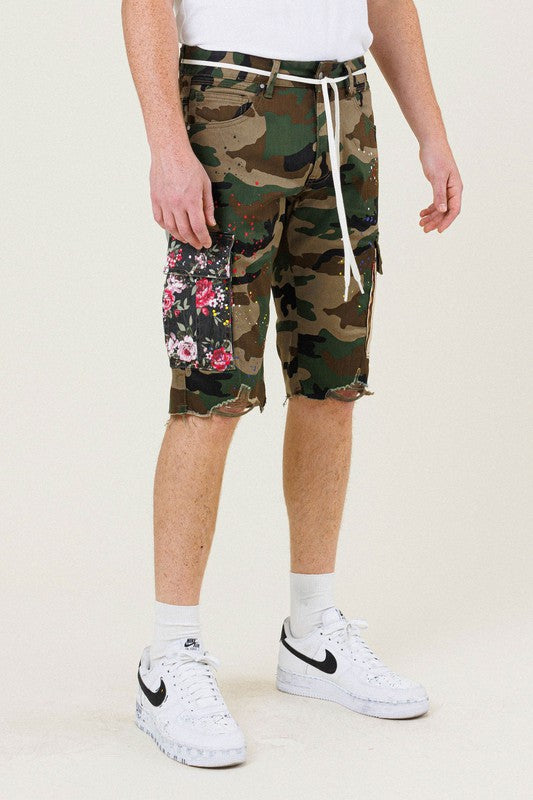 FIRST ROW: CAMO FLOWER PATCH CARGO SHORTS (side view on model’