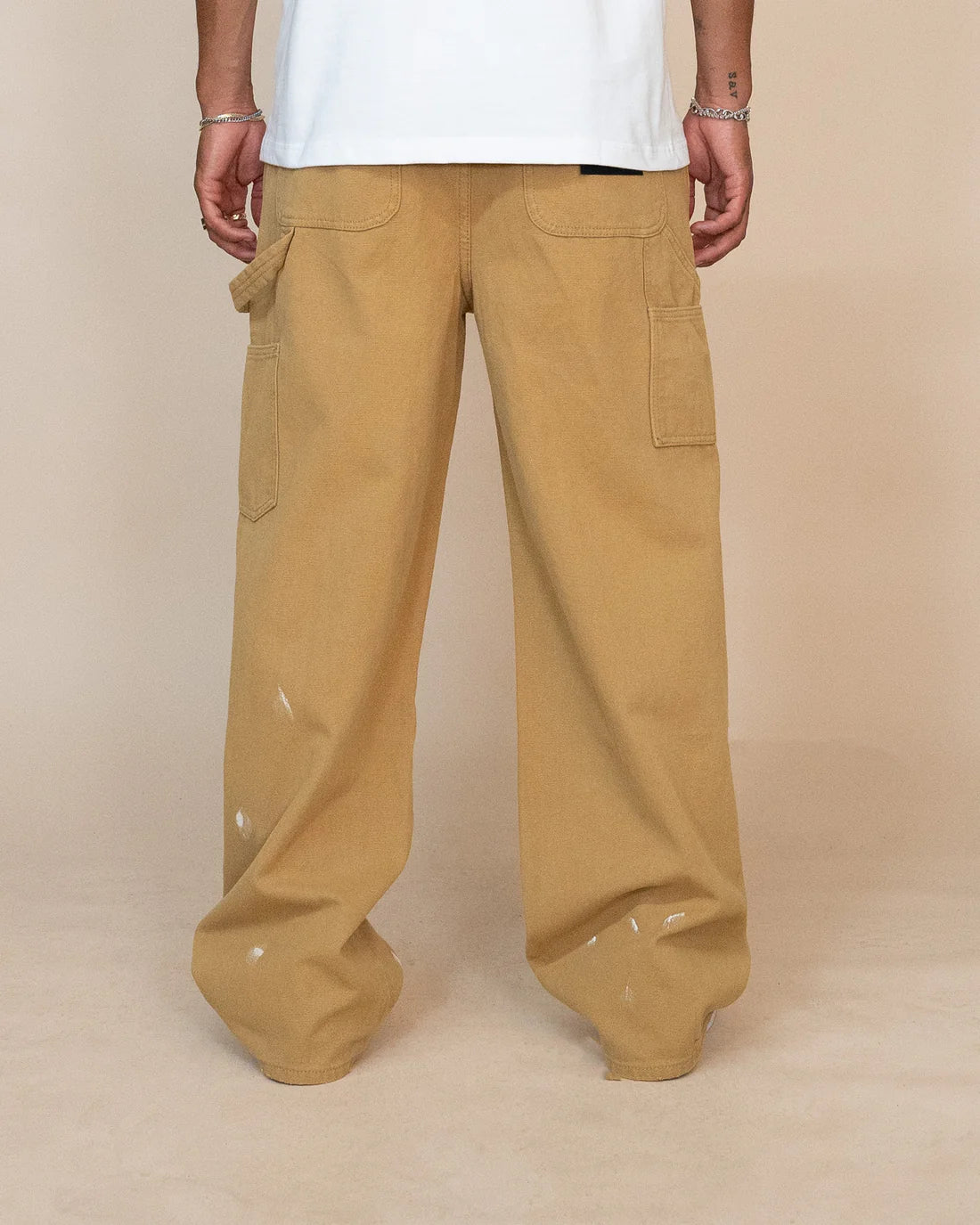 EPTM: VINTAGE CARPENTER PANTS TAN (on model) back view